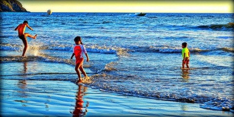 Kids Playing on Beach Photo